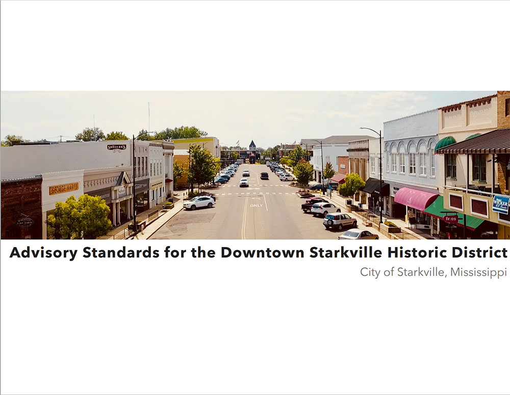 cover of booklet - image of downtown starkville down center of street with buildings on both sides