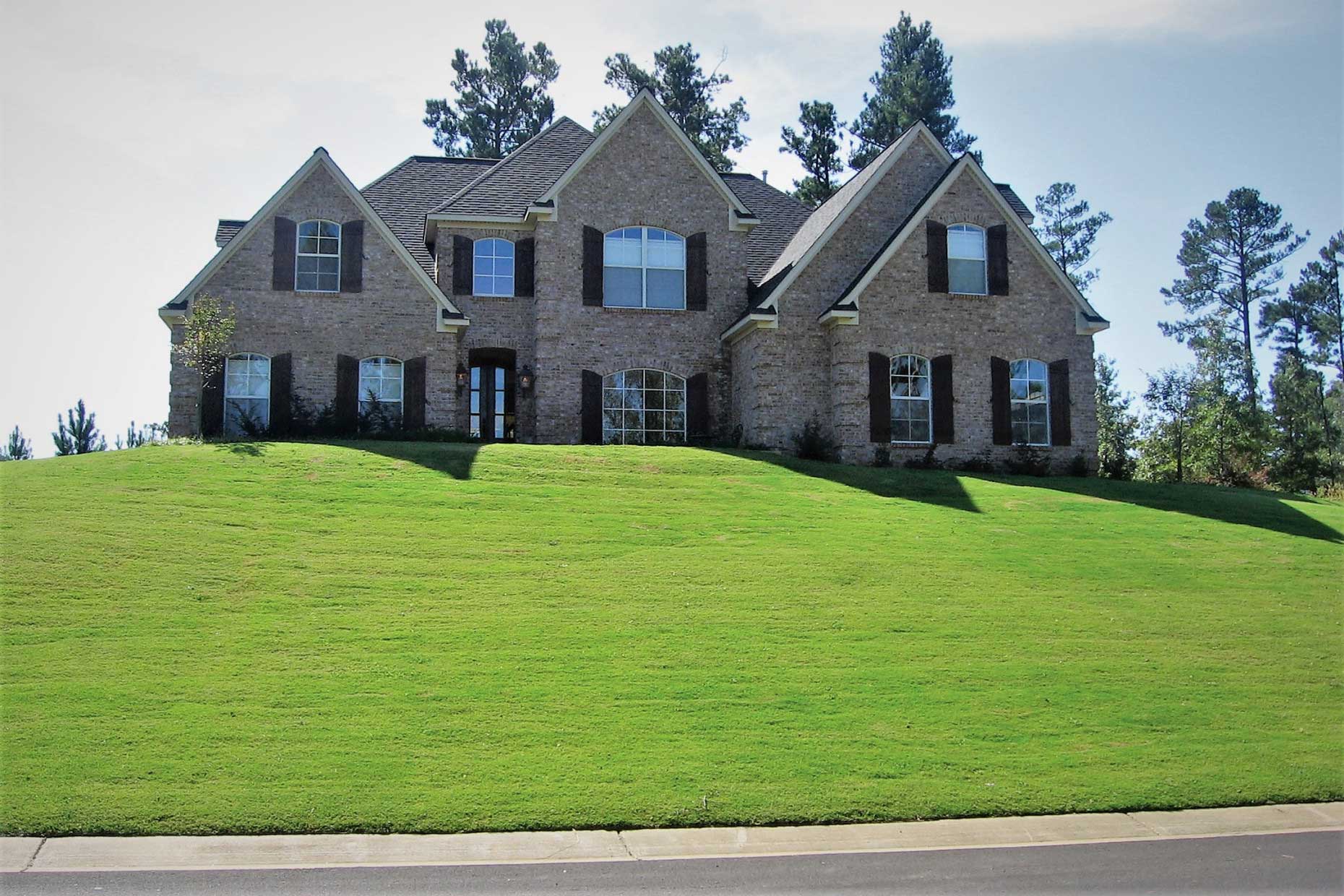 modern home on green hill